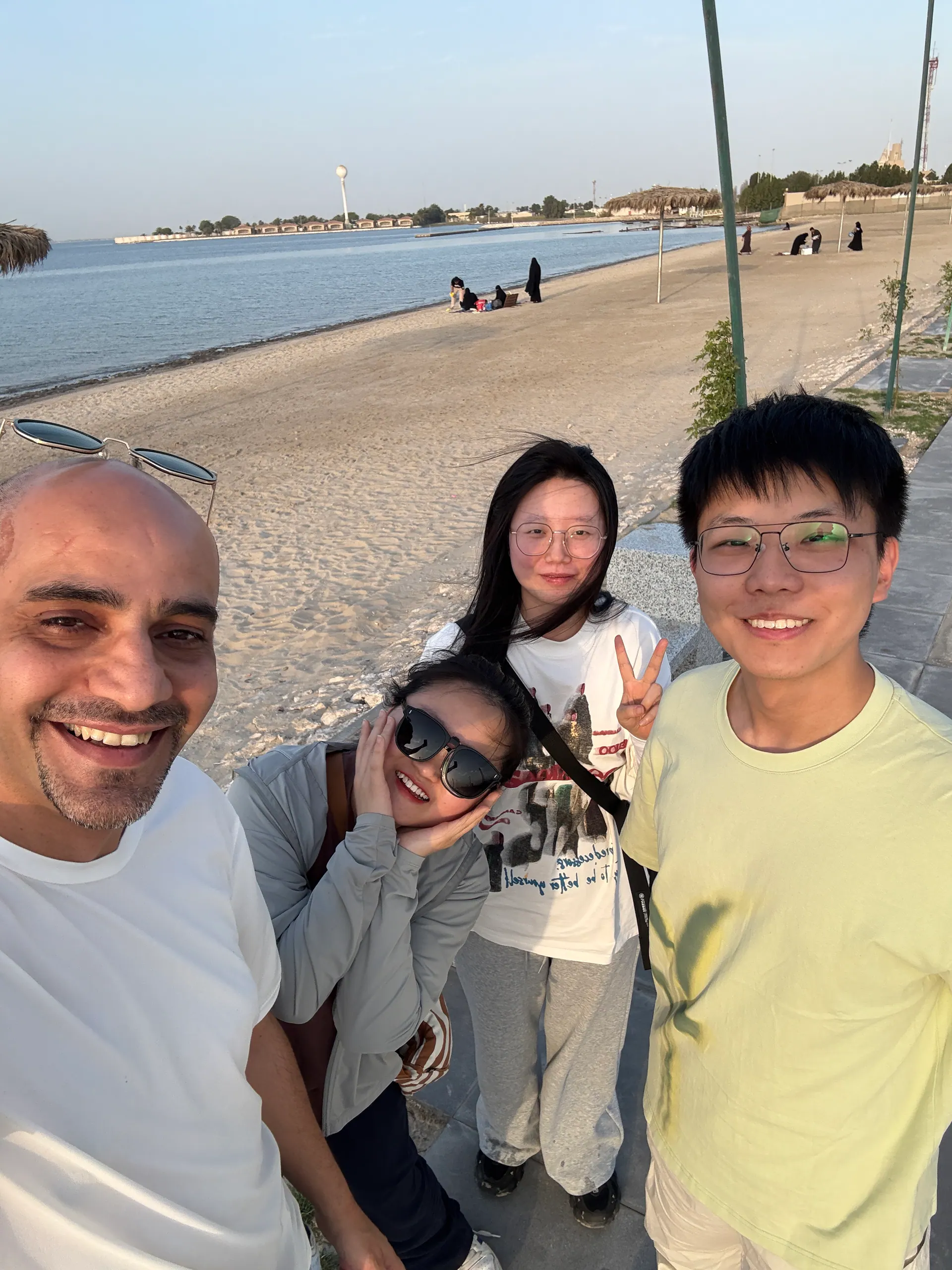 Beachside visitor group photo
