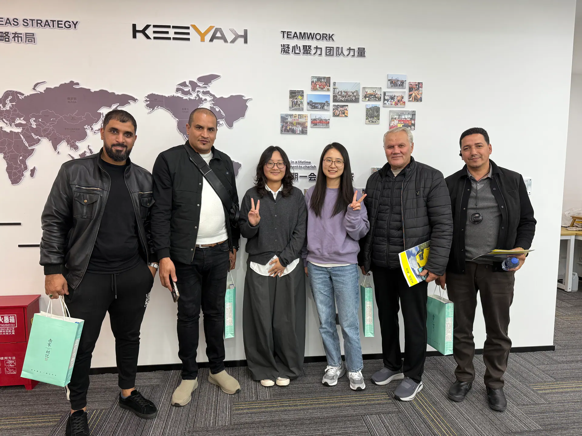 KEEYAK team and visitors taking a group photo at the KEEYAK office